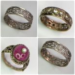 Collection of white metal rings. Various designs, featuring two Size J simple decorative, a Size N
