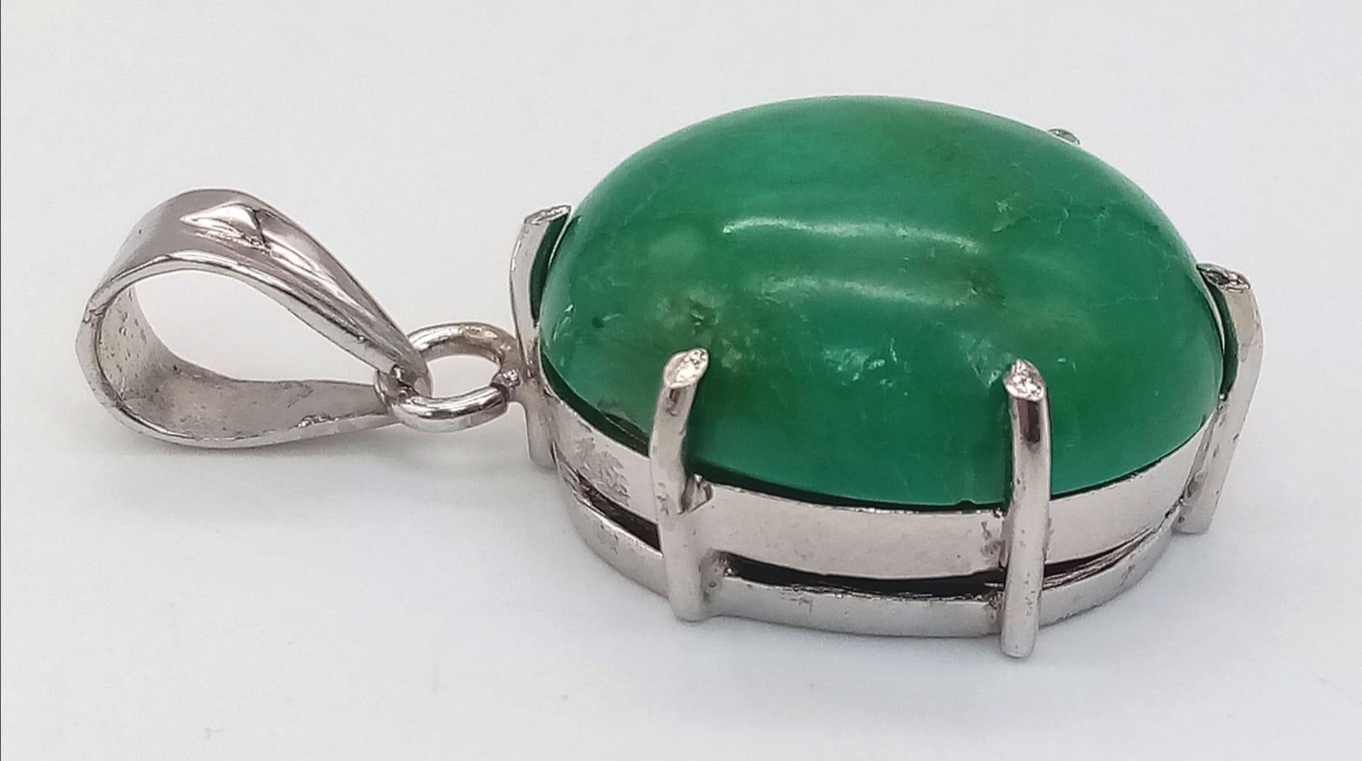 An Oval Turquoise Cabochon Pendant. Set in 925 Sterling Silver. 7.80g. 4cm - Image 2 of 4