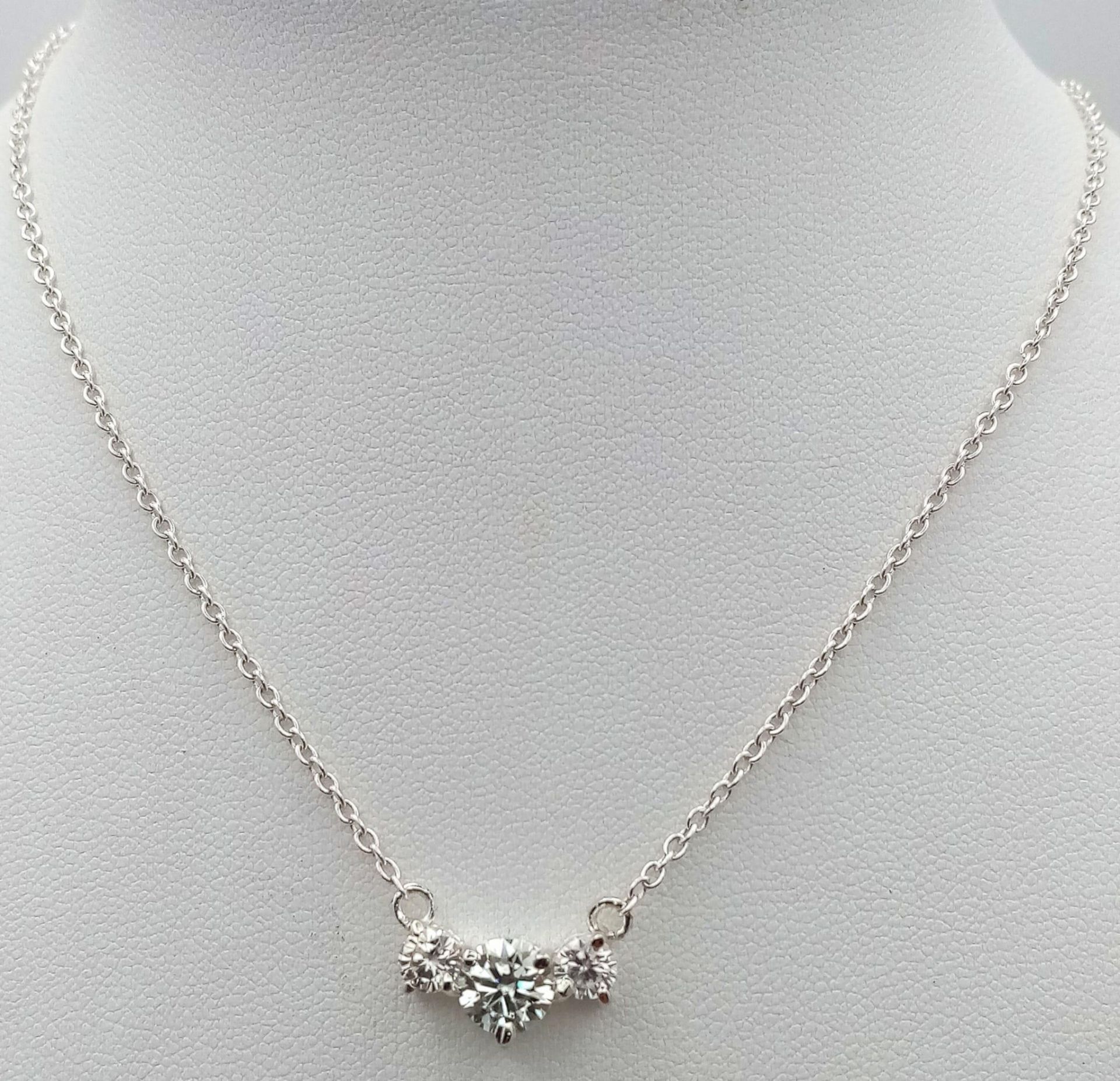 A Three Stone Moissanite Pendant on a Silver Chain and a matching pair of Moissanite Studs earrings. - Image 2 of 4