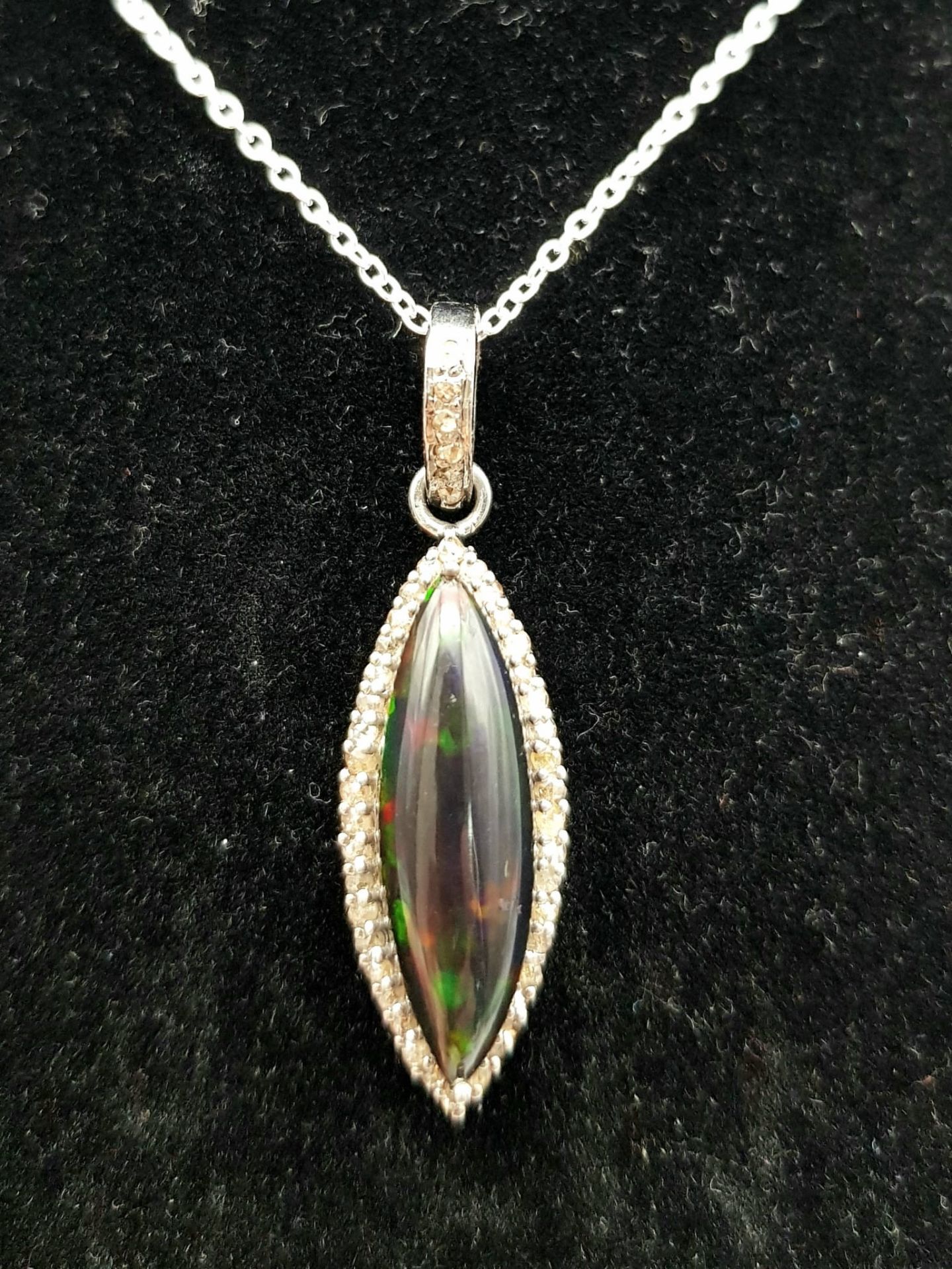 A Marquise Cut Black Opal Pendant with Diamond Surround on 925 Silver and a Silver Chain. 3.75ct - Image 2 of 6