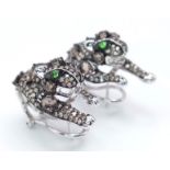 A STUNNING PAIR OF 14K WHITE GOLD DIAMOND , CHAMPAGNE DIAMONDS AND EMERALD PANTHER EARRINGS. 10.5gms