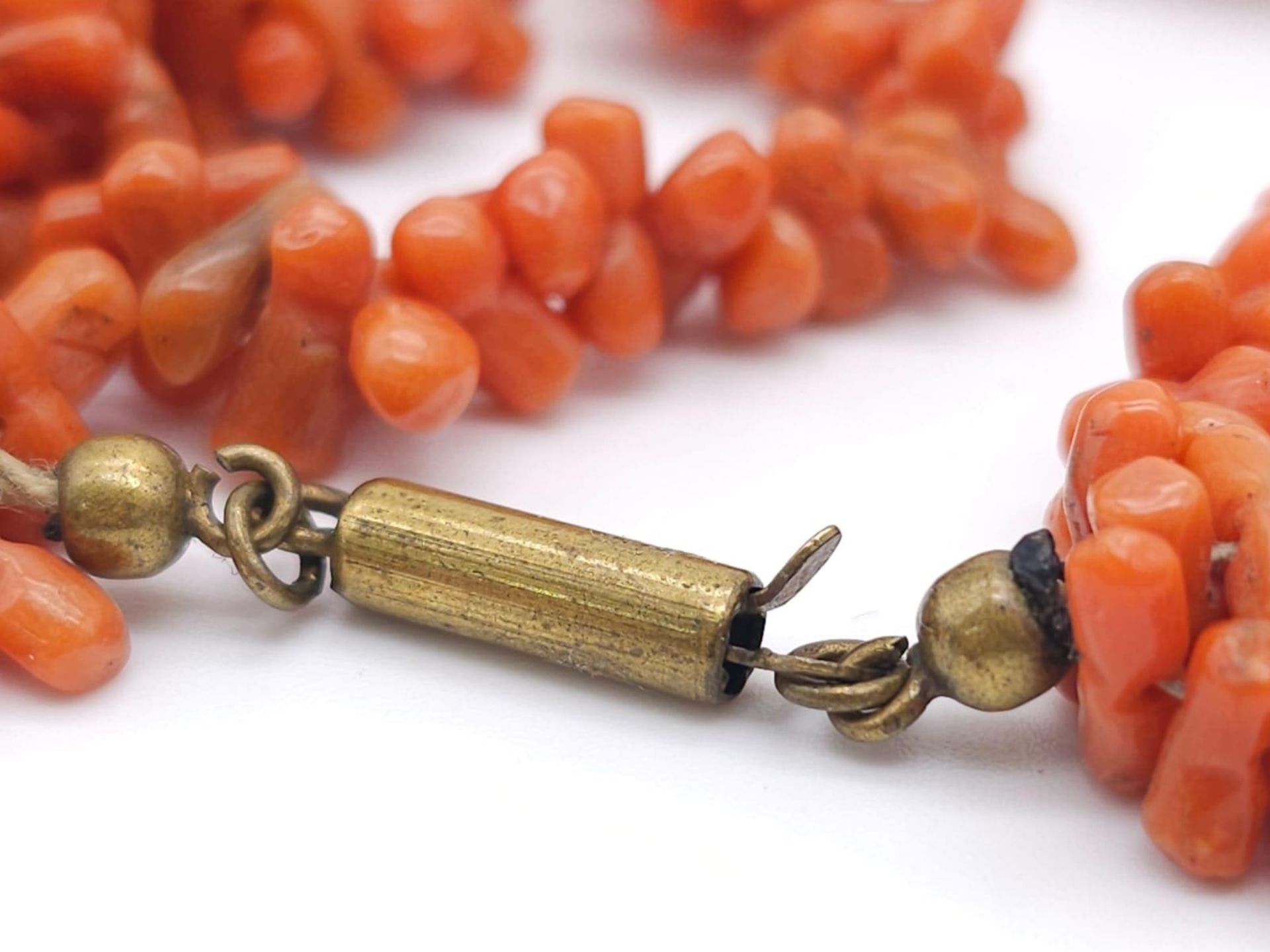 Three Strand Orange Coral Necklace. Measuring 42cm in length, this bold necklace is a bright - Image 3 of 5