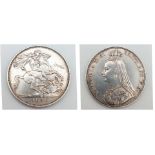 An 1889 Queen Victoria Silver Crown Coin. VF grade but please see photos.