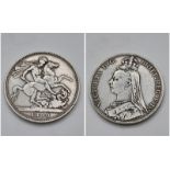 An 1890 Queen Victoria Silver Crown Coin. VF grade but please see photos.