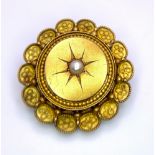 An Antique 15K Yellow Gold and Pearl Mourning Brooch. Centre pearl with circle and oval