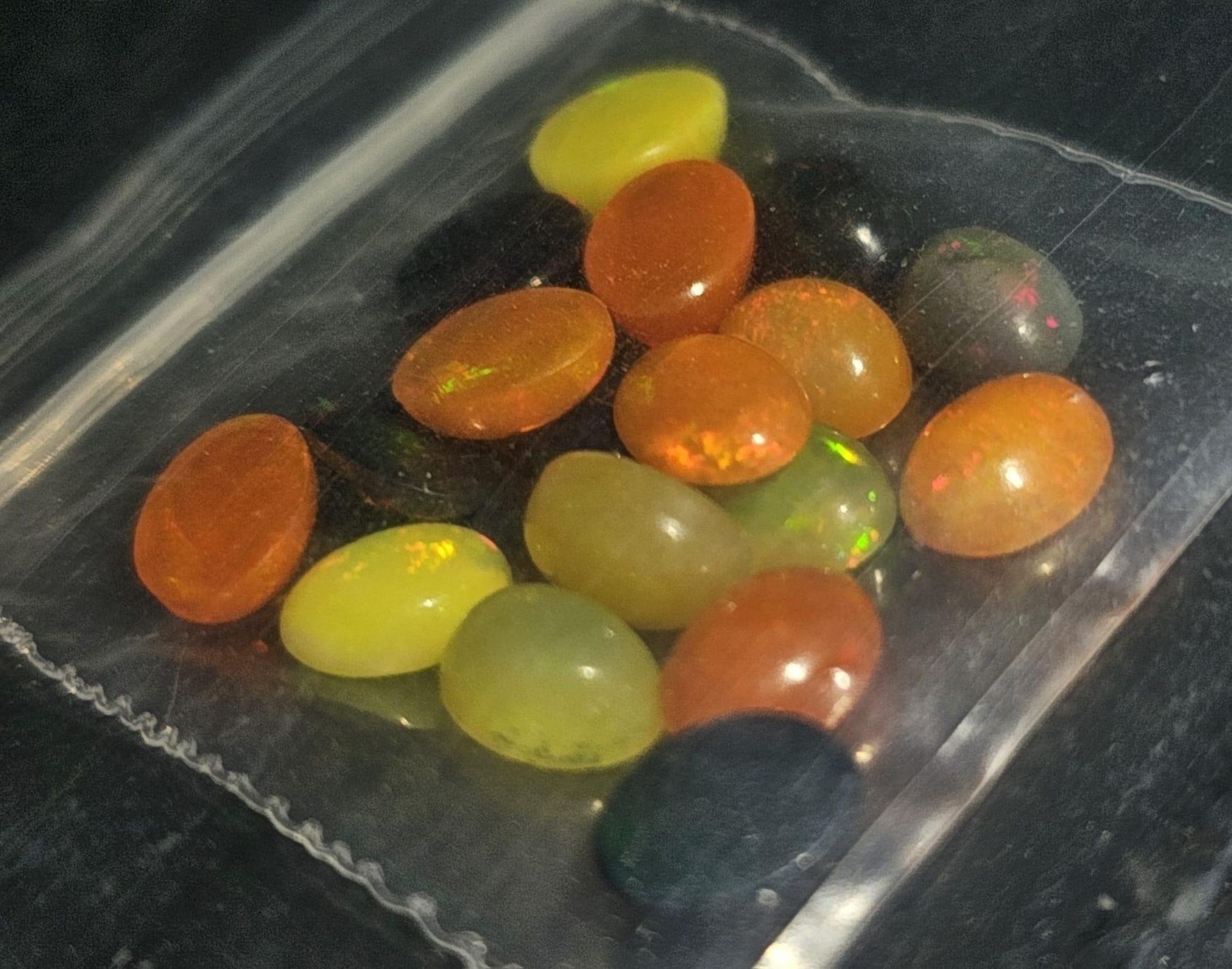A lot of Natural Opal Gemstone. Yellow Blue and Prange Colour. 13.41ct in total.