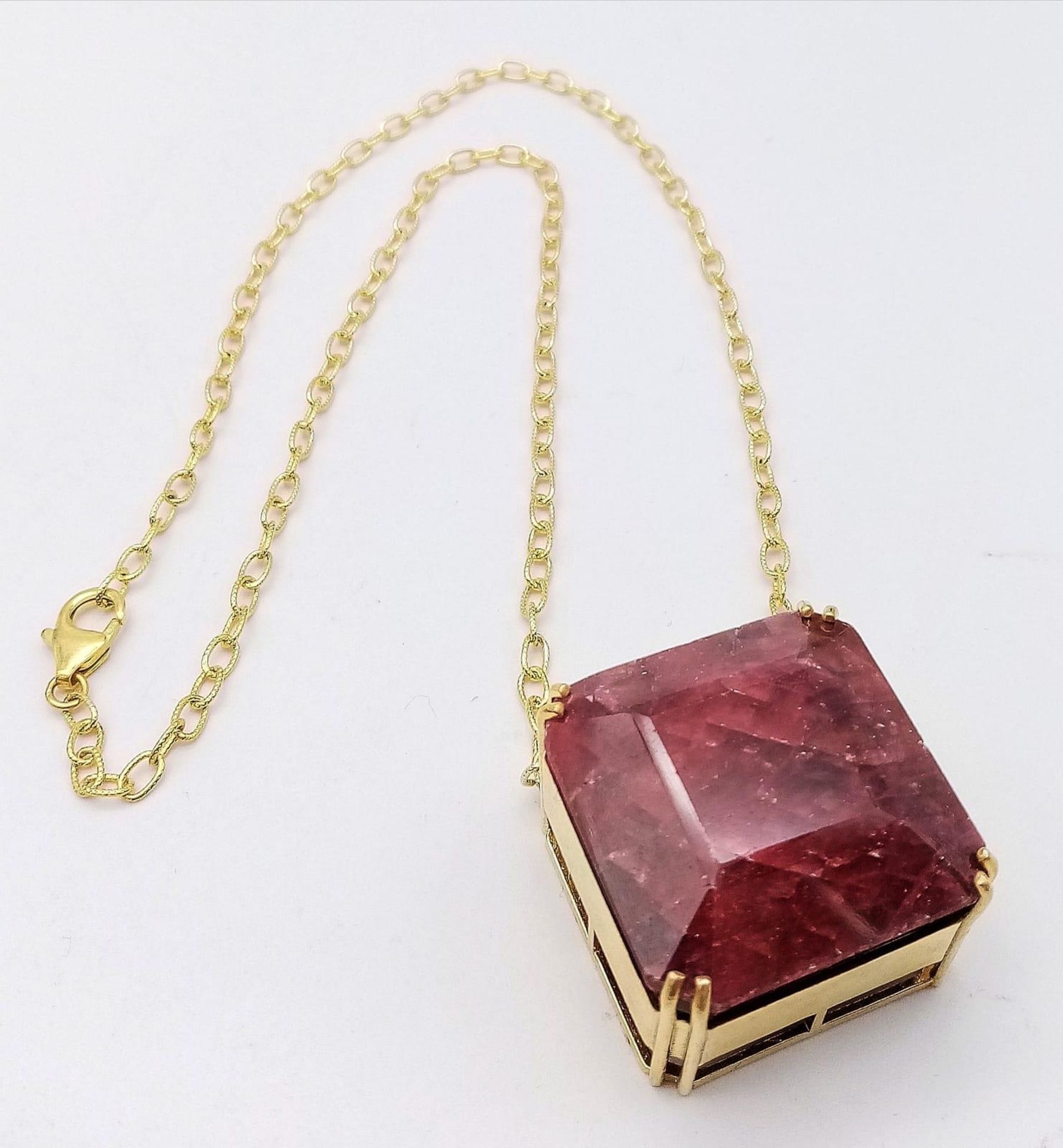 A Square-Cut 237ct Ruby Pendant in Gold Plated 925 Silver on a Gold Plated 925 Chain. Pendant 3cm