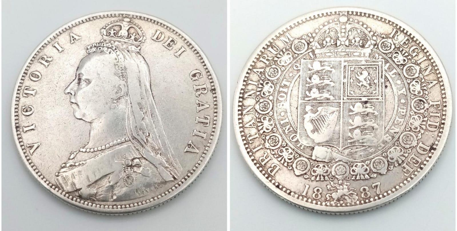 An 1887 Queen Victoria Silver Half Crown Coin. VF grade but please see photos.
