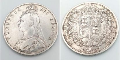 An 1887 Queen Victoria Silver Half Crown Coin. VF grade but please see photos.