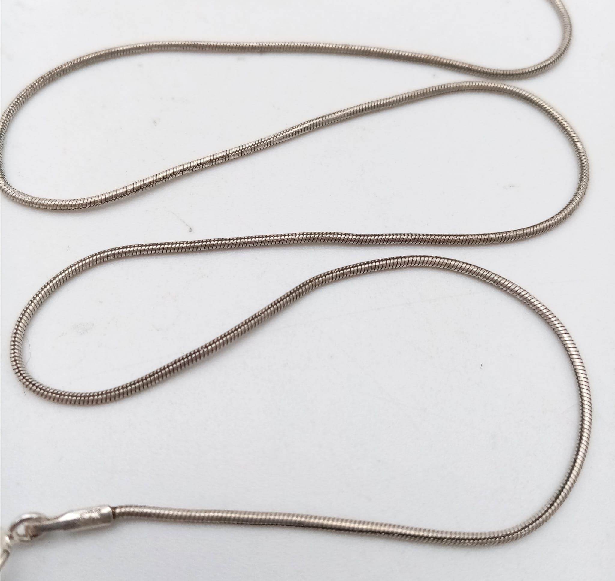 Trio of Sterling Silver Necklaces. One plain necklace, one with a turquoise pendant and the third - Image 3 of 8