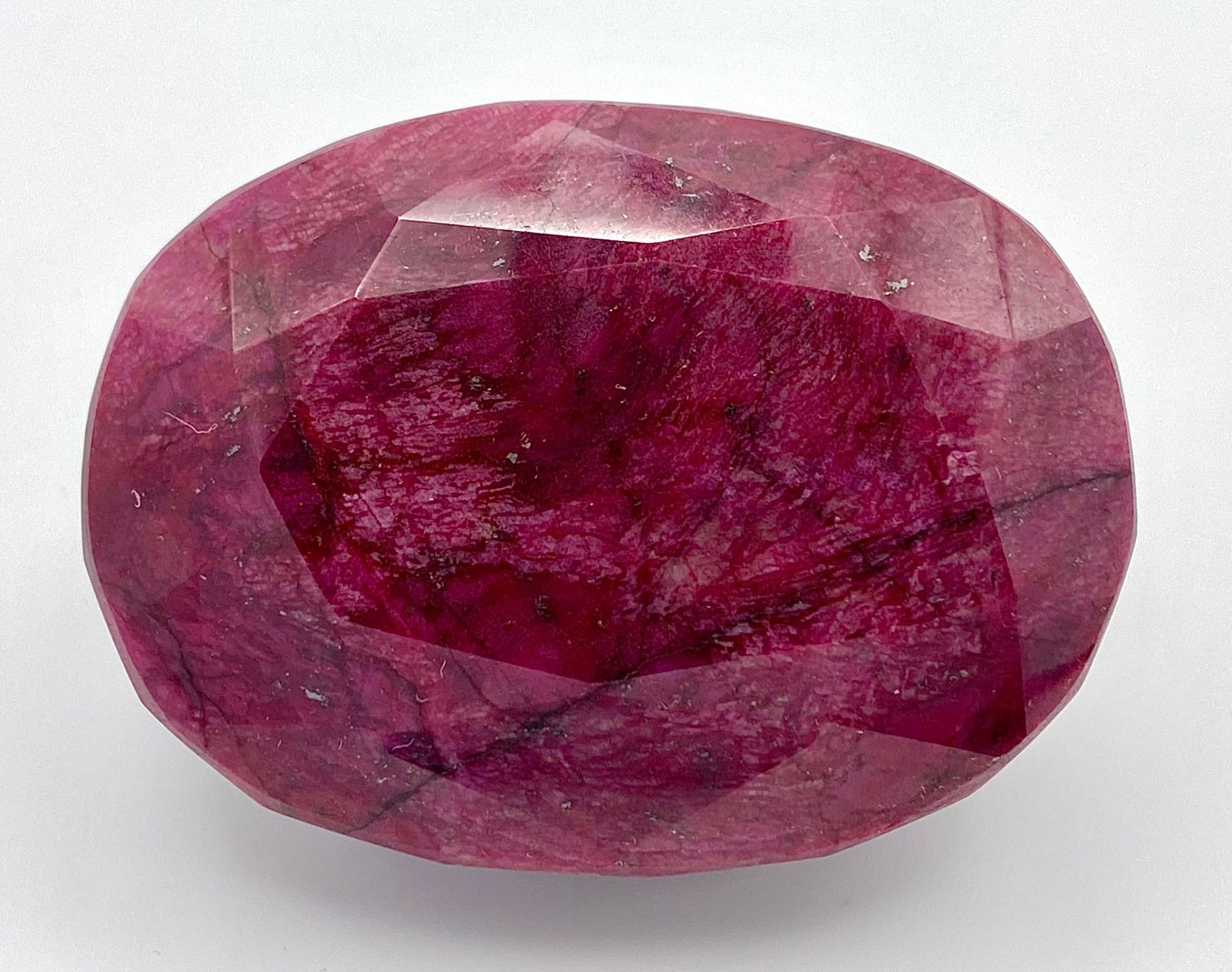 A Large 800ct Ruby - Oval cut and heat treated. No certificate so as found. 6.5 x 4.5cm.