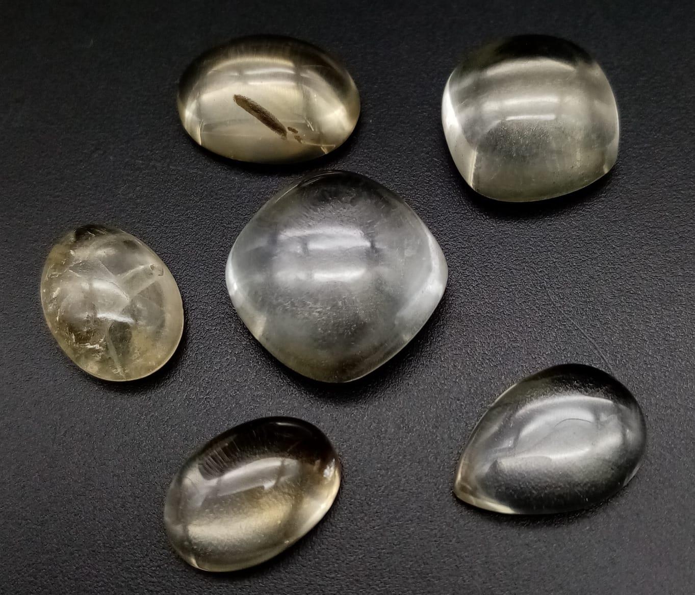 A Lot of 6 Pcs of 36.35 Ct Cabochon Citrine Gemstones in Mix Shapes.