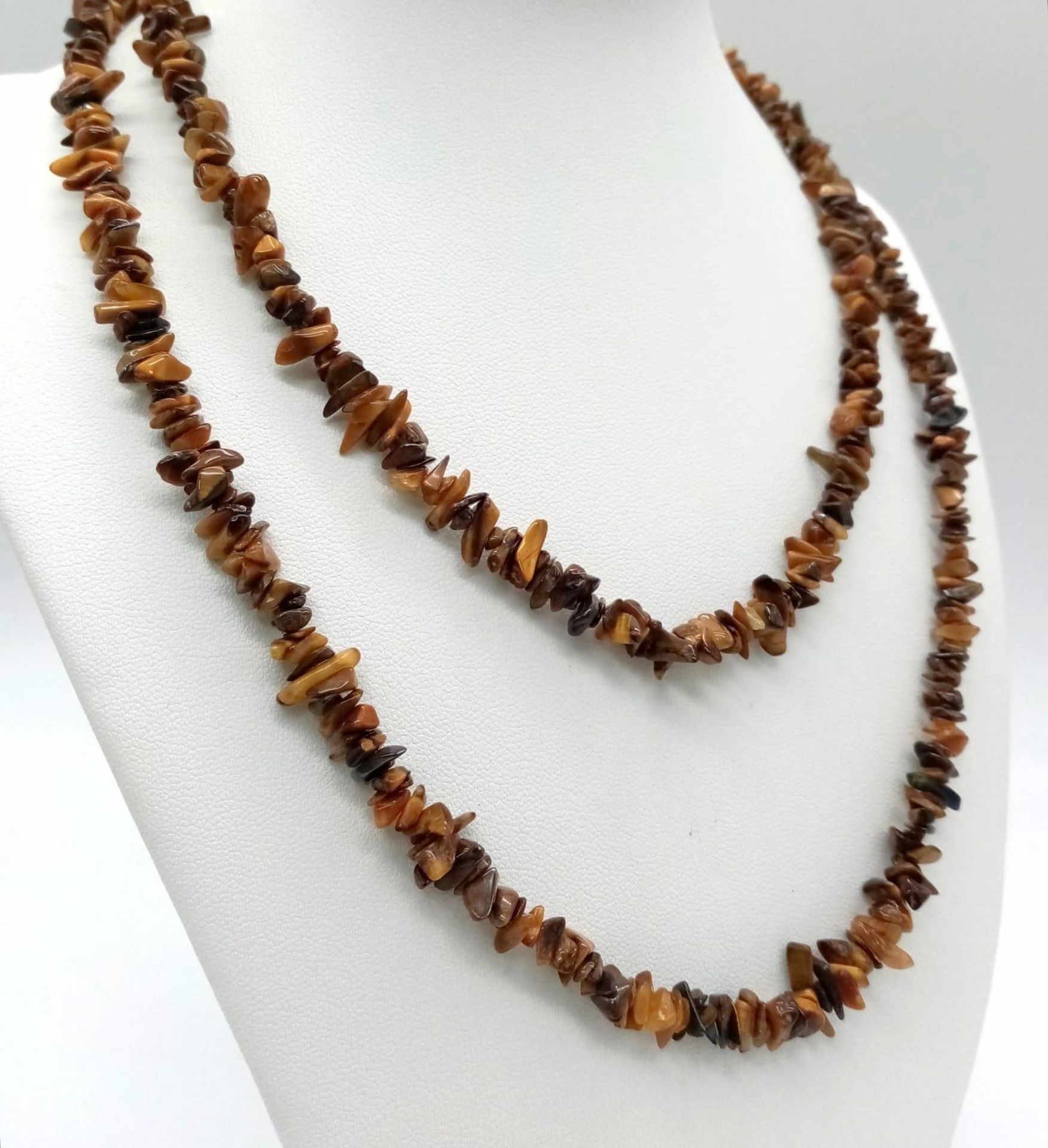 A parcel of Two Vintage Long Natural Stone Necklaces. Both measure 90cm in length. The white - Image 2 of 3