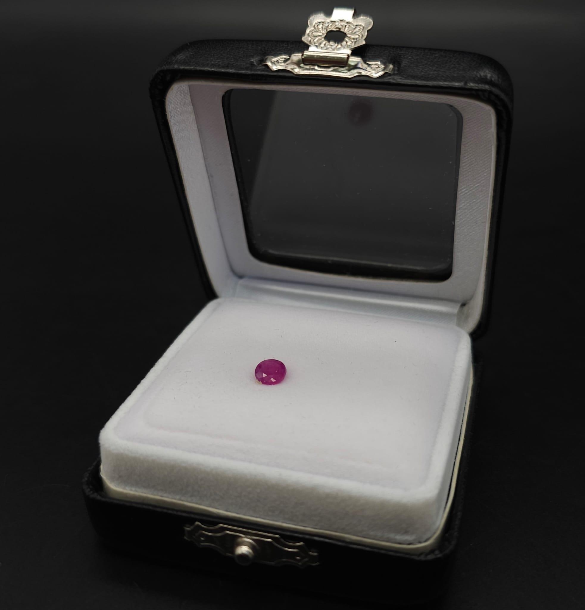 A 0.73ct Burmese Ruby Gemstone. Comes with a GFCO certificate and a presentation case. - Image 5 of 5