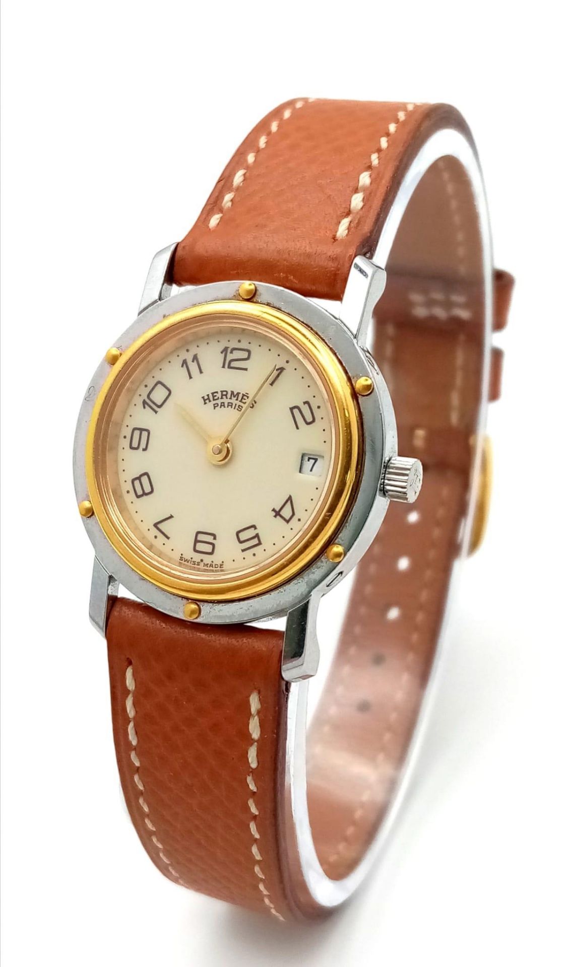 A FABULOUS HERMES OF PARIS LADIES WRISTWATCH WITH GOLD AND STAINLESS STEEL BODY AND TASTEFUL CREAM