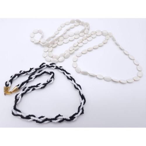 Parcel of two vintage necklaces. Featuring one Black & White Twisted Small Bead Necklace with Gold