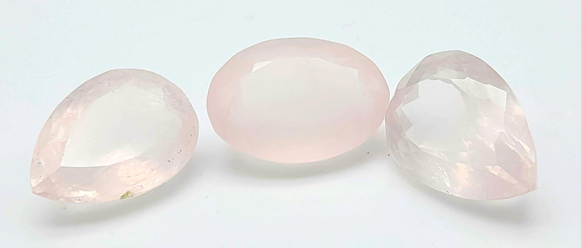 A 61ct Rose Quartz Gemstones Lot of 3 Pieces. Mixed Shapes.