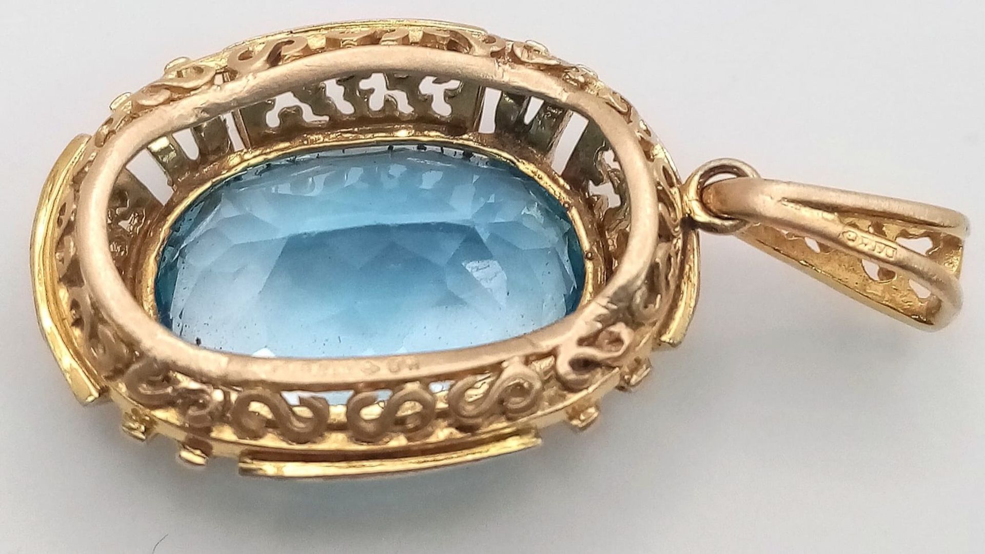 A 12ct Aquamarine and 9K Yellow Gold Pendant. 4cm. 7.75g total weight. - Image 3 of 4