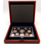 A Royal Mint 2007 Executive Proof Coin Set. 12 coins in total. Comes in a wood presentation case.