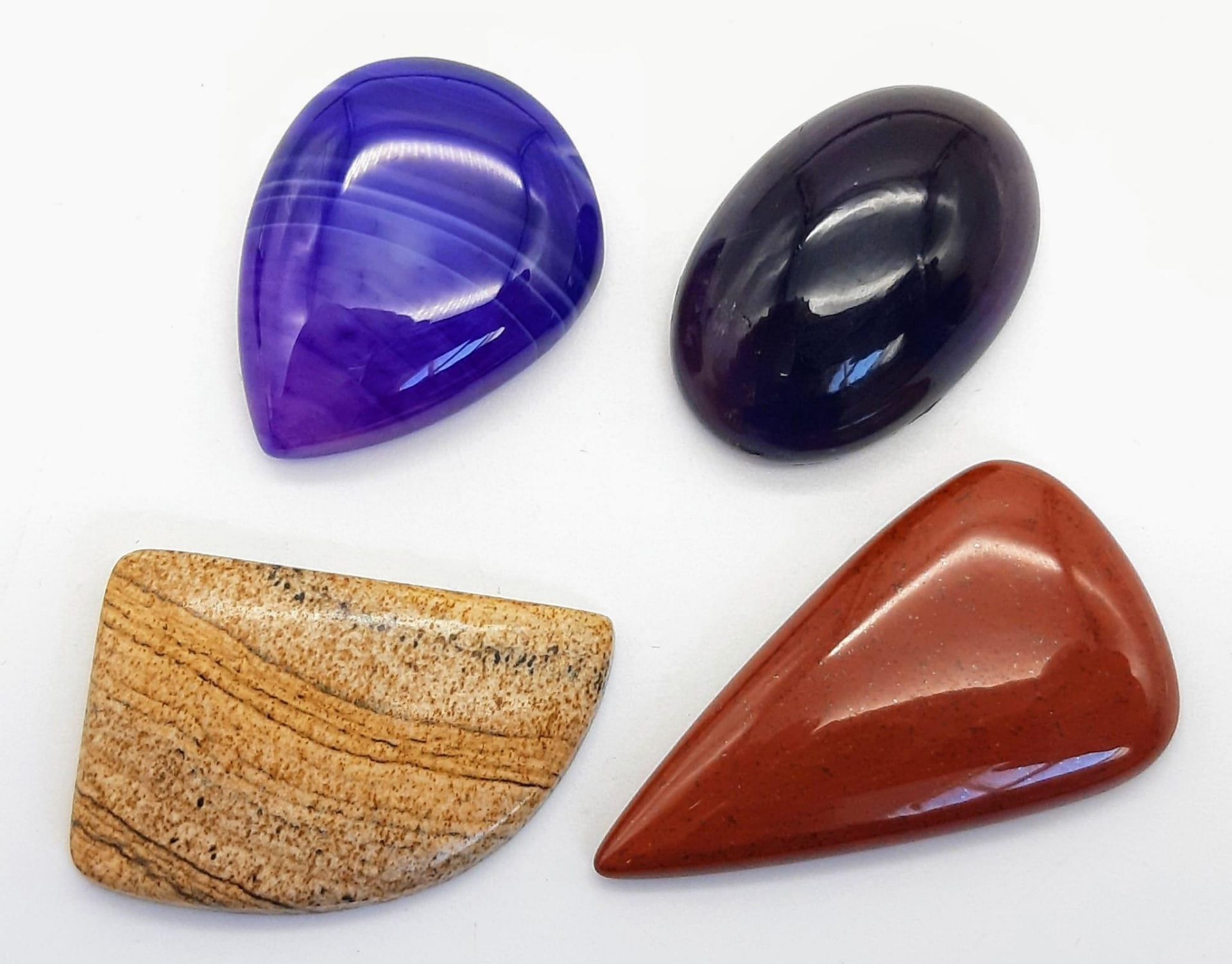 A 104ctw Mixed Lot of 4 Cabochon Gemstones - Agate, Amethyst, etc. Ref: CV38