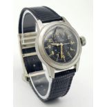 A U.S. MILITARY BULOVA MID SIZE QUARTZ WATCH ON BLACK LEATHER STRAP . 32mm