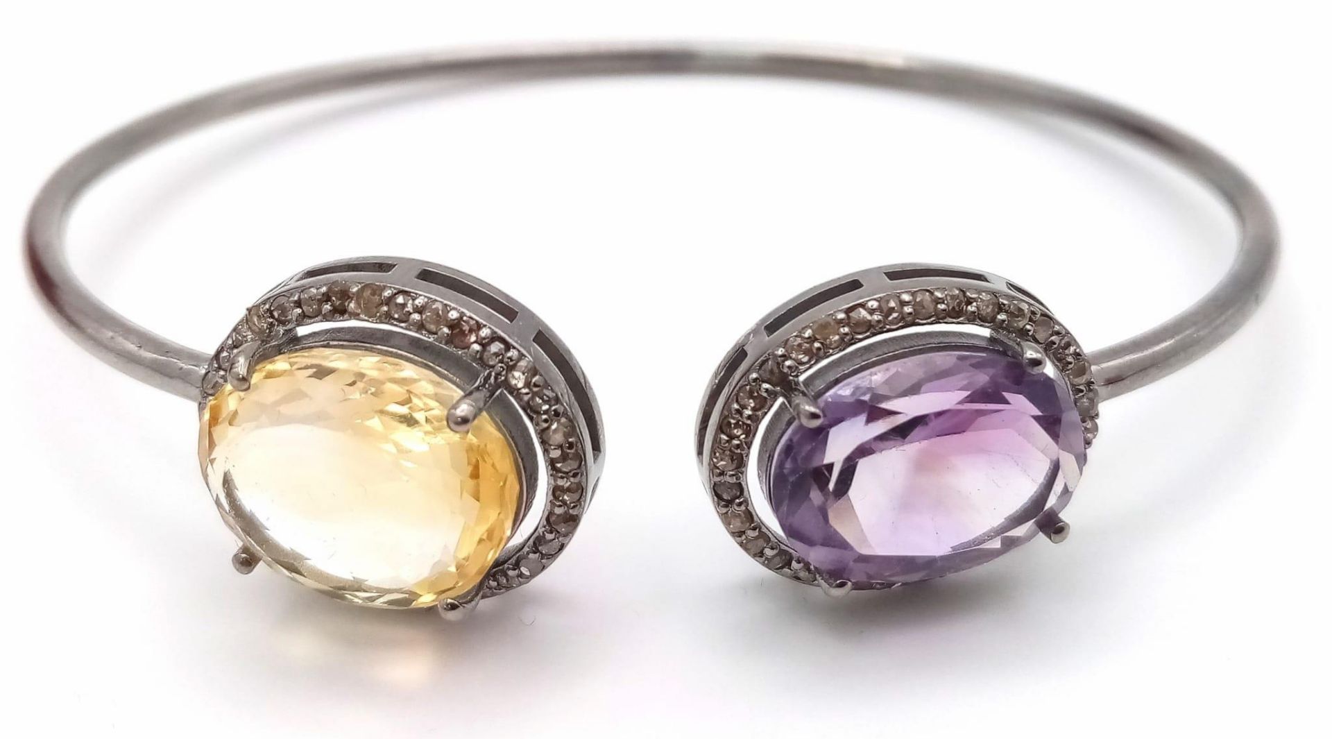 A Citrine, Amethyst & Diamond 925 Silver Crossover Design Bangle. Diamonds- 0.80ctw. Amethyst - 5.