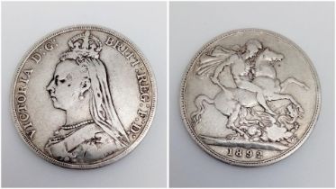 An 1892 Queen Victoria Silver Crown Coin. VF grade but please see photos.