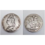 An 1892 Queen Victoria Silver Crown Coin. VF grade but please see photos.