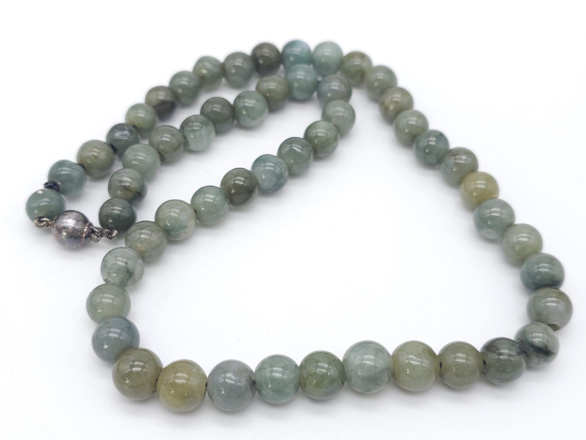 A Jade Beaded Necklace with a 925 Silver Vintage Clasp. Measuring 44cm in length with a total weight