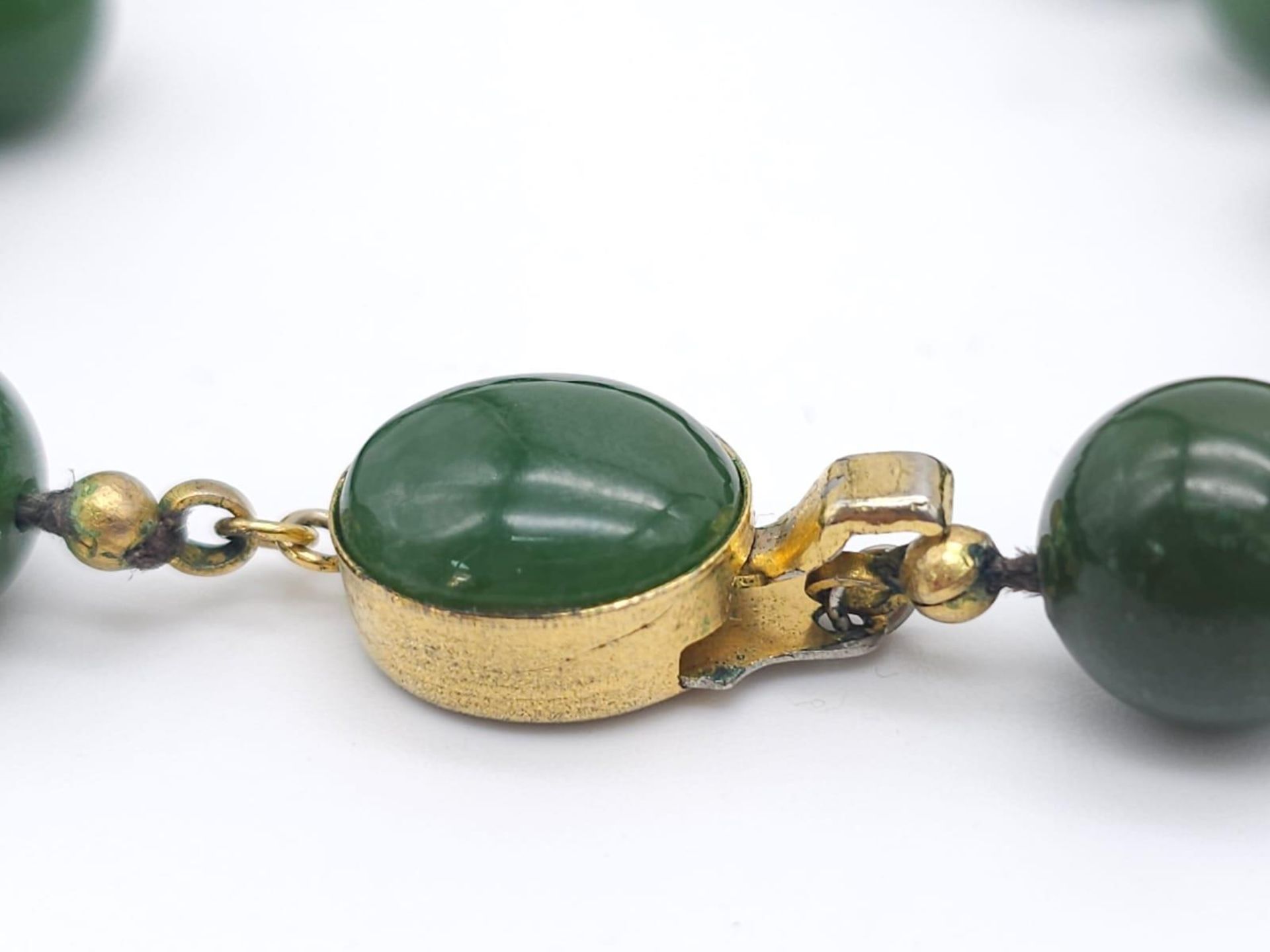 Long Green Jade Beaded Necklace. Measuring 68cm in length, this necklace is filled with rich green - Image 3 of 6