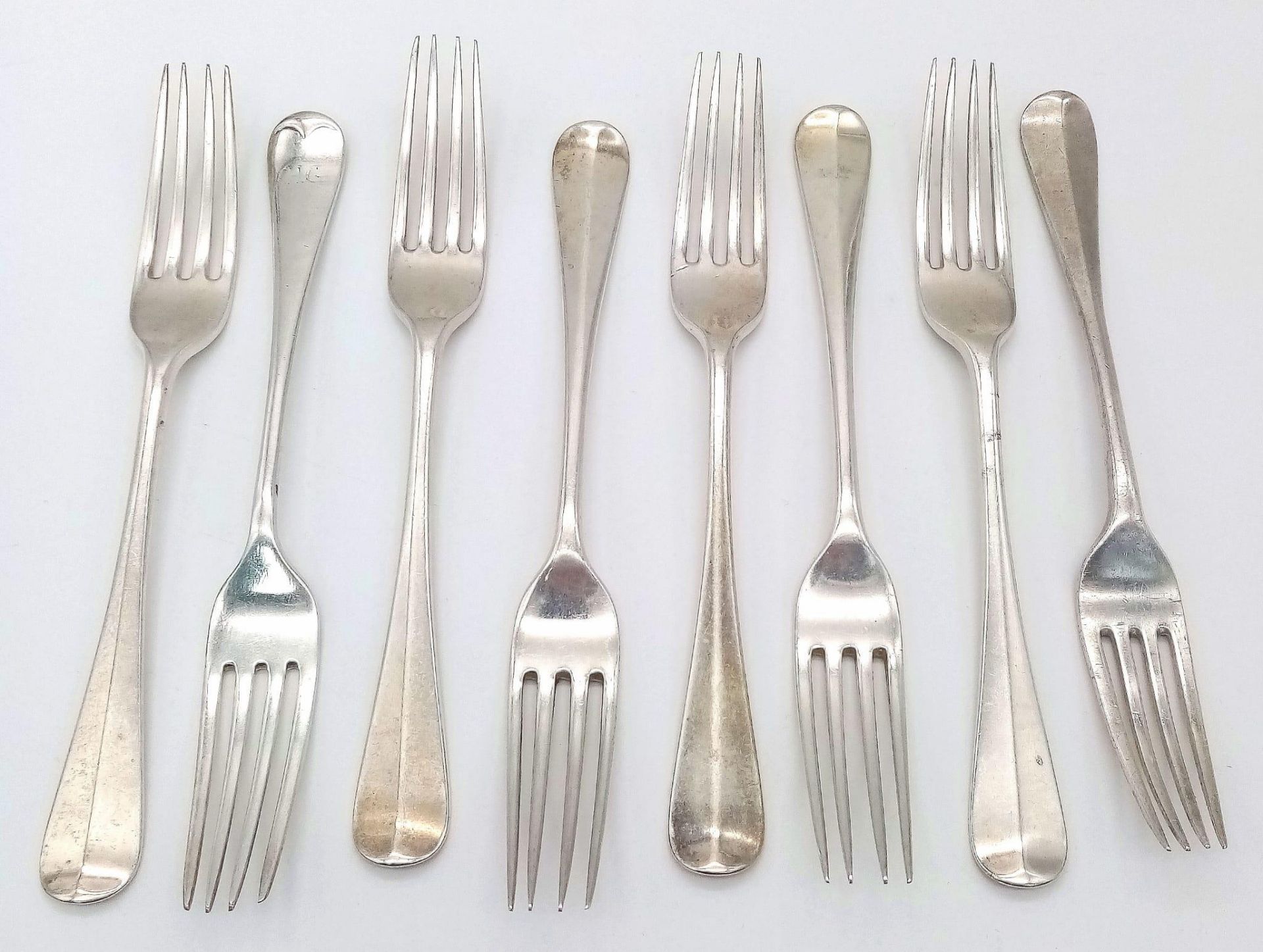 Eight Antique Mid-Size Sterling Silver Cutlery Forks. 17cm. Hallmarks for London 1924. 407g weight.