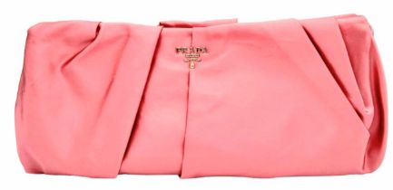 A Prada Pink Pleated Clutch Bag. Satin exterior with silver-toned hardware and press lock closure to