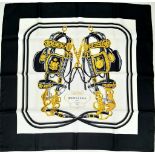 A Hermes Carre Silk Scarf "Brides de Gala" in Black, White and Gold Equestrian Print, features a