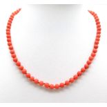 A vintage Orange Beaded Necklace. Measuring 38cms in length, this necklace is a great, bold addition