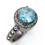 A Blue Topaz and Rose Cut Diamond 925 Sterling Silver Ring. Blue Topaz- 1.50ct. Diamonds- 0.22ctw.