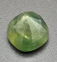 A 5.69ct Cushion Cut Bluish Green Sapphire Madagascar Origin. GGI Certified.