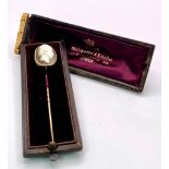 An Antique Mid-Carat Gold Cameo Mourning Stick-Pin. 7.5cm. 4.67g total weight. Comes with original