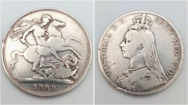 An 1889 Queen Victoria Silver Crown Coin. VF grade but please see photos.