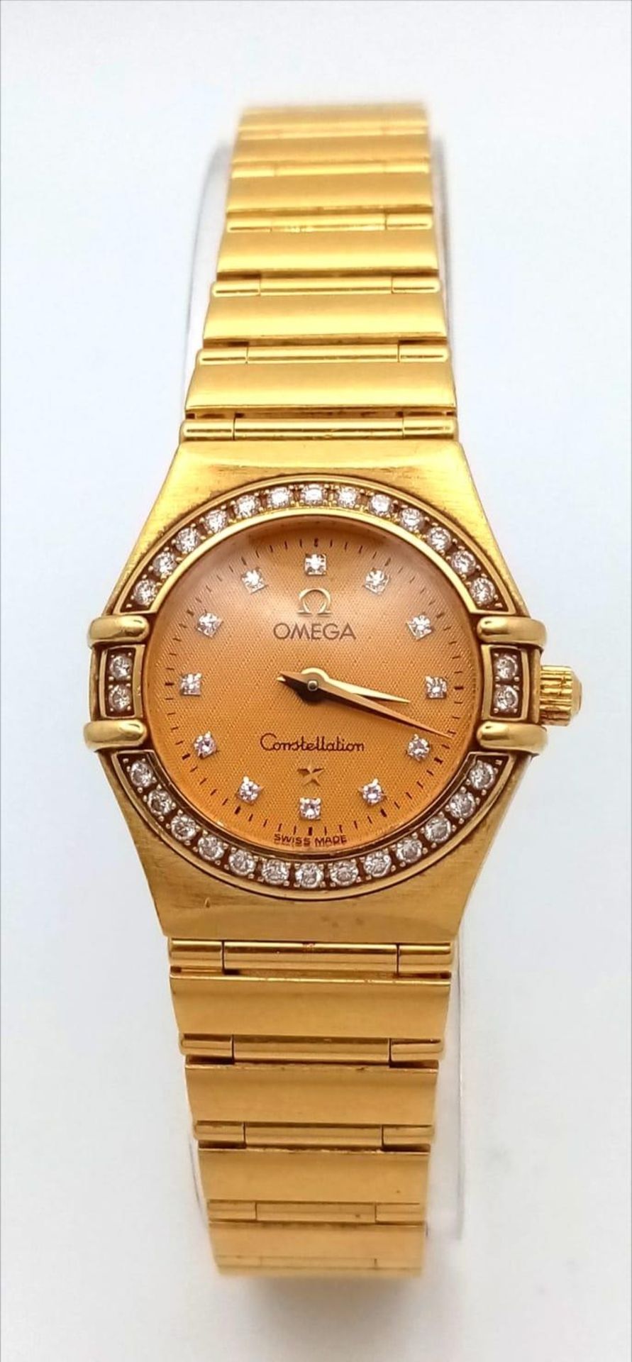 An Omega 18K Yellow Gold Constellation Ladies Watch. 18K gold bracelet and case - 23mm. Gold tone