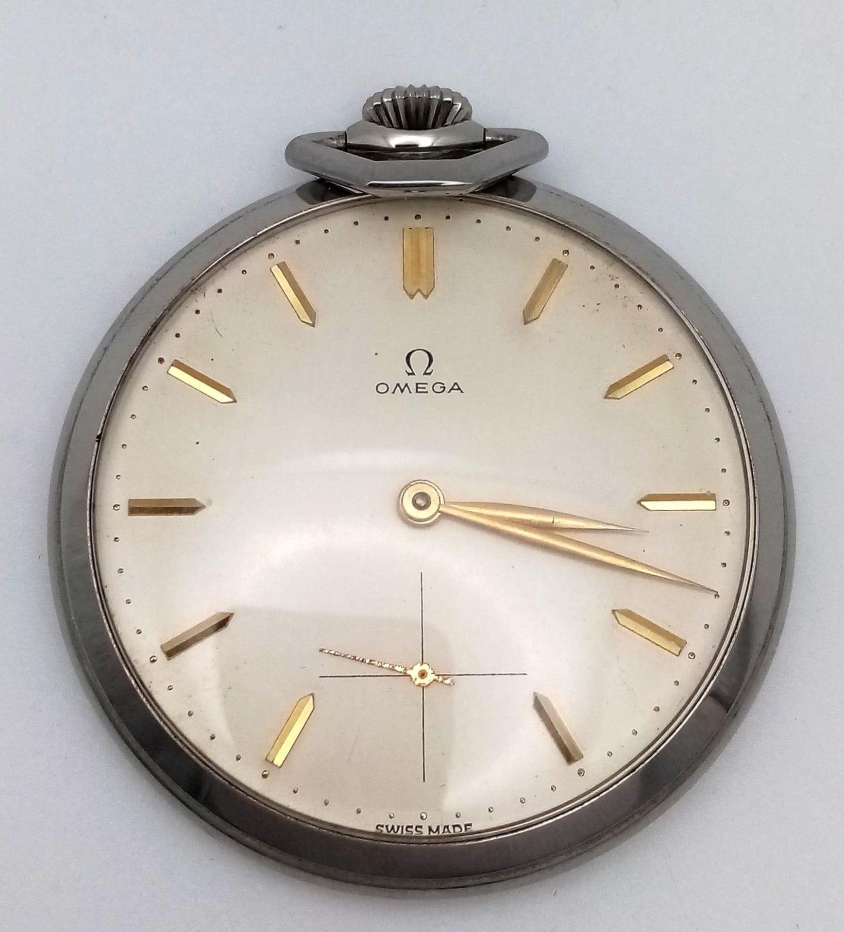 A VINTAGE TOP WINDING OMEGA POCKET WATCH WITH GOLD HANDS AND NUMERALS IN EXCELLENT CONDITION . 50mm