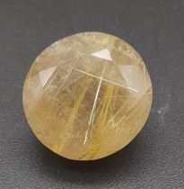 A 16.05 Ct Faceted Rutile Quartz in Round Shape. GLI Certified.