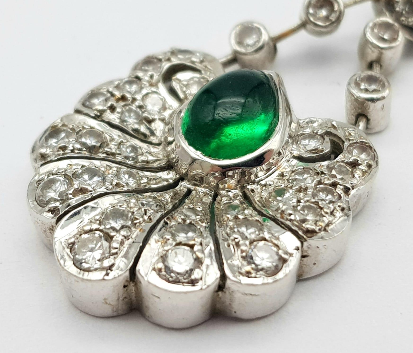 An 18K White Gold Emerald and Diamond Pendant. Central teardrop emerald with a white diamond petal - Image 2 of 4