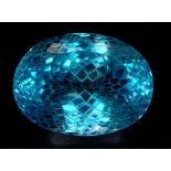 A 92.96ct Blue Topaz Gemstone, in Oval Flower Laser Cut. Comes with the GFCO Swiss Certificate