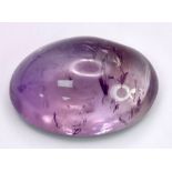 A 21.55 Ct Oval Cabochon Natural Amethyst. GLI Certified.