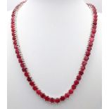 A Ruby Gemstone Tennis Necklace set in 925 Silver. Round cut rubies. 45cm length. 49g total