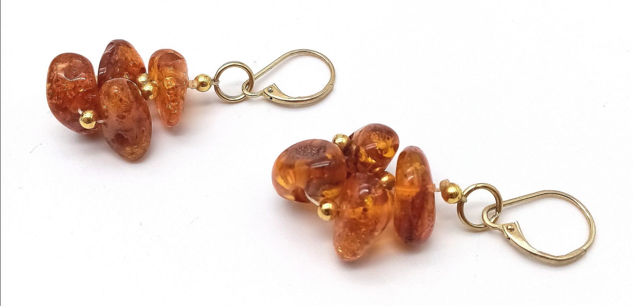 A Pair of Amber Cluster Earrings set in 9K Gold Earrings. 6g total weight. 3cm drop - Image 2 of 4