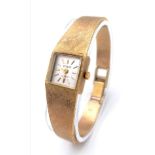A Vogue Quartz 9K Gold Ladies Watch. 9k gold bracelet and case - 15mm width. 25.74g weight. Approx