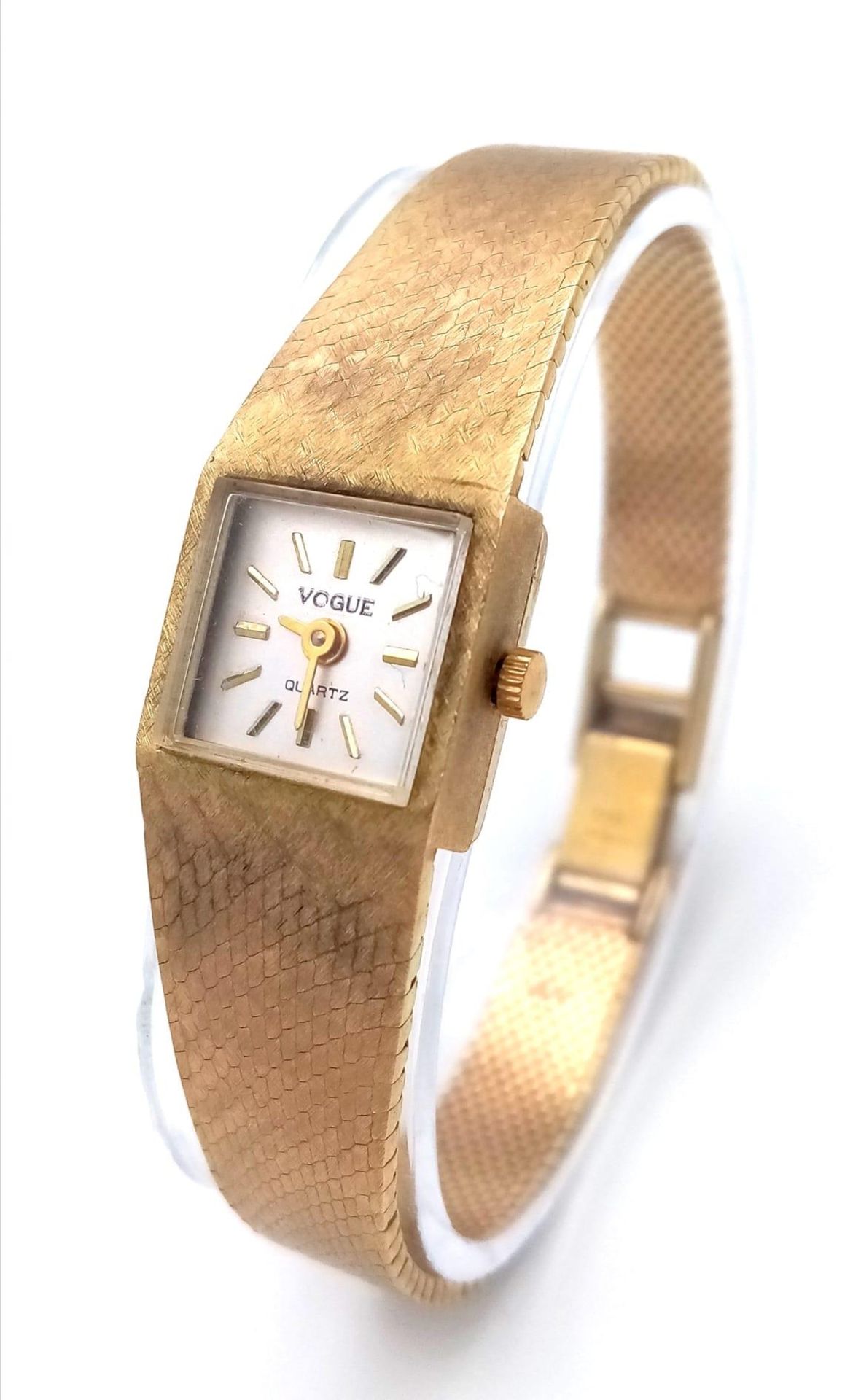 A Vogue Quartz 9K Gold Ladies Watch. 9k gold bracelet and case - 15mm width. 25.74g weight. Approx