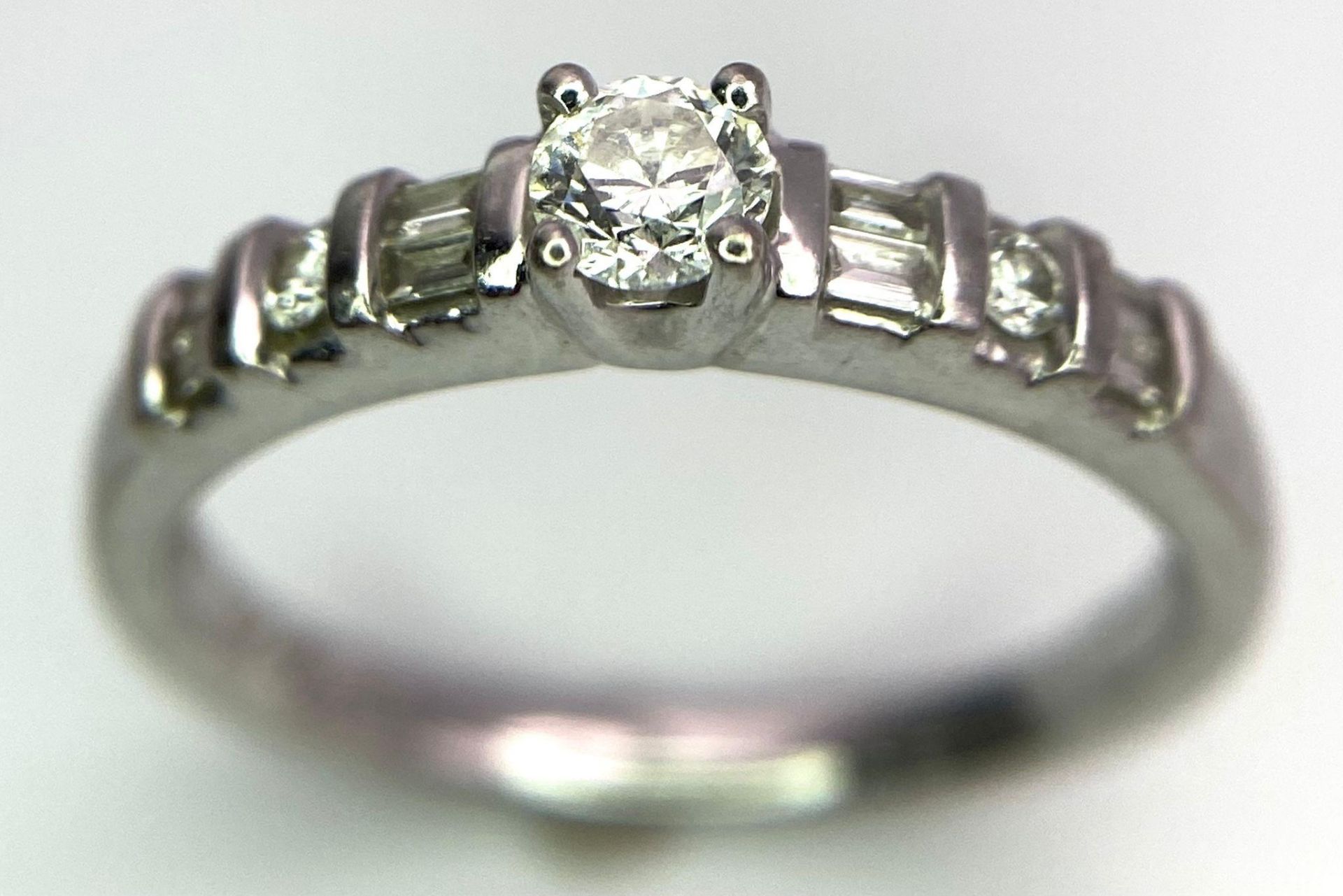 18kt White Gold, Diamond Ring. Centre Stone, 0.30ct Round Cut Diamond, is accented by shoulder - Image 3 of 5