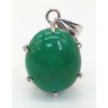 An Oval Turquoise Cabochon Pendant. Set in 925 Sterling Silver. 7.80g. 4cm